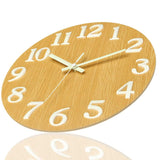 Minimalist wooden wall clock with luminous hands and hour markers, providing a soft glow and timeless elegance in low light.