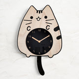 Creative silent wall clock with a cat silhouette and wagging tail, bringing a whimsical and tranquil vibe to any room.