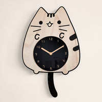 Creative silent wall clock with a cat silhouette and wagging tail, bringing a whimsical and tranquil vibe to any room.